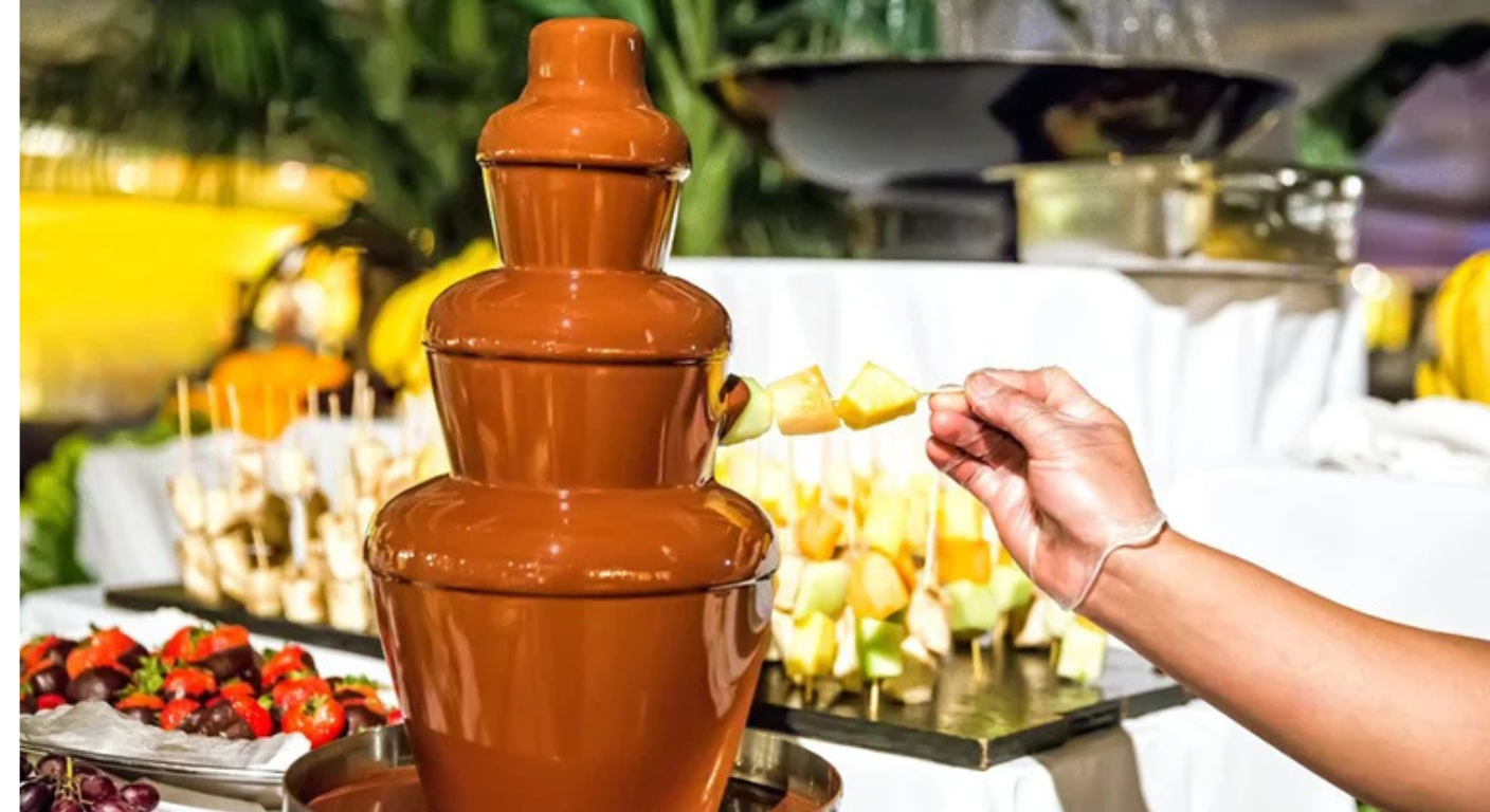 Chocolate fountain dessert counter at a wedding